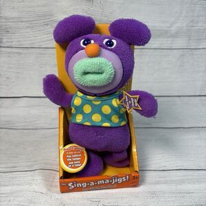 NEW In BOX Sing A Ma Jigs Purple Blue Mouth Singing Doll Clementine Works 2010
